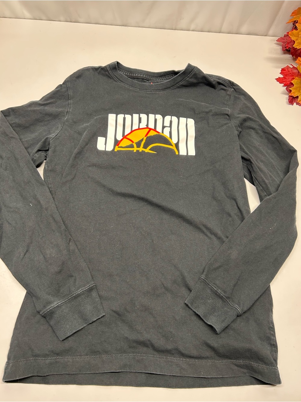 Jordan Black Long-Sleeve Logo Tee with White and Yellow Graphic